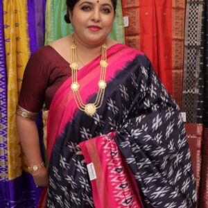 Black Pochampally Ikat saree with white motifs and magenta pink border