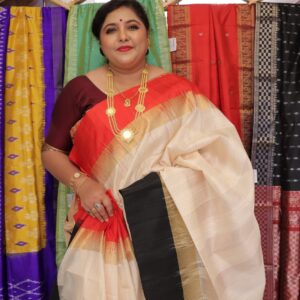 Pure raw silk saree for women in cream with red and black detailing and golden border