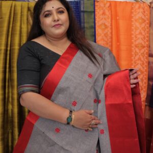 Grey Dhaniakhali handloom cotton saree with red border and traditional red woven motifs